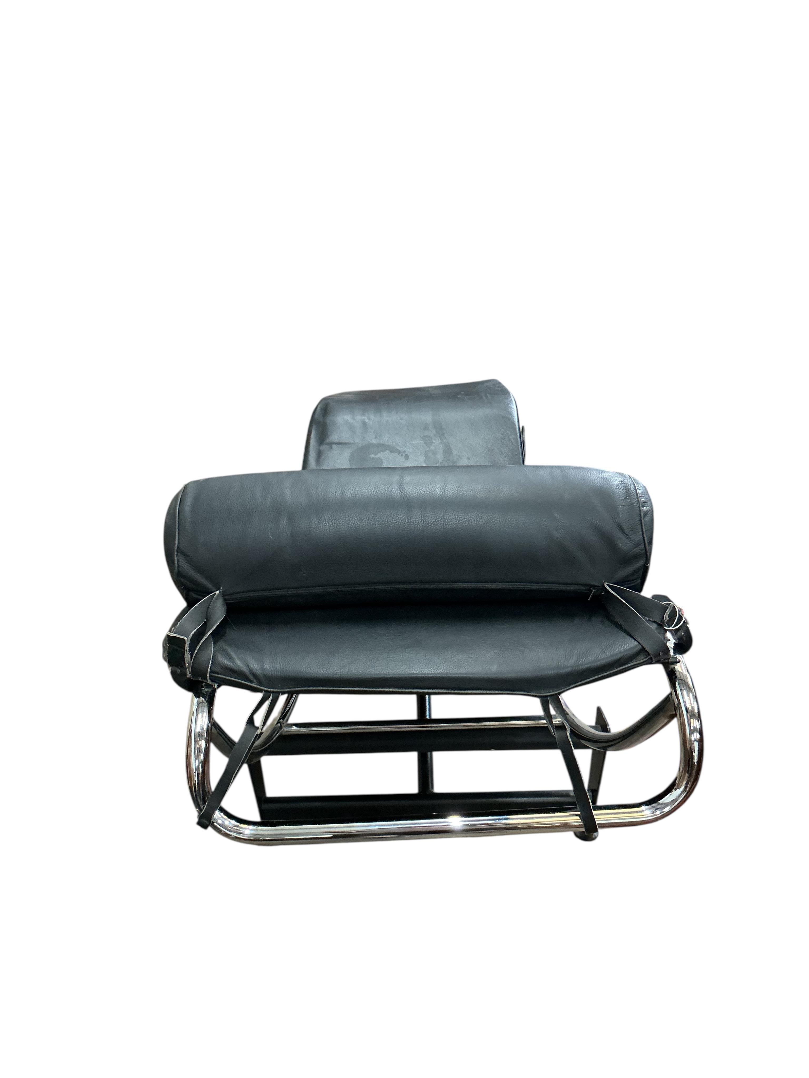 A Corbusier style chrome and black leather daybed, width 53cm, length 150cm